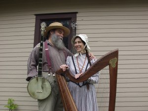 Curtis and Loretta with banjo and harp